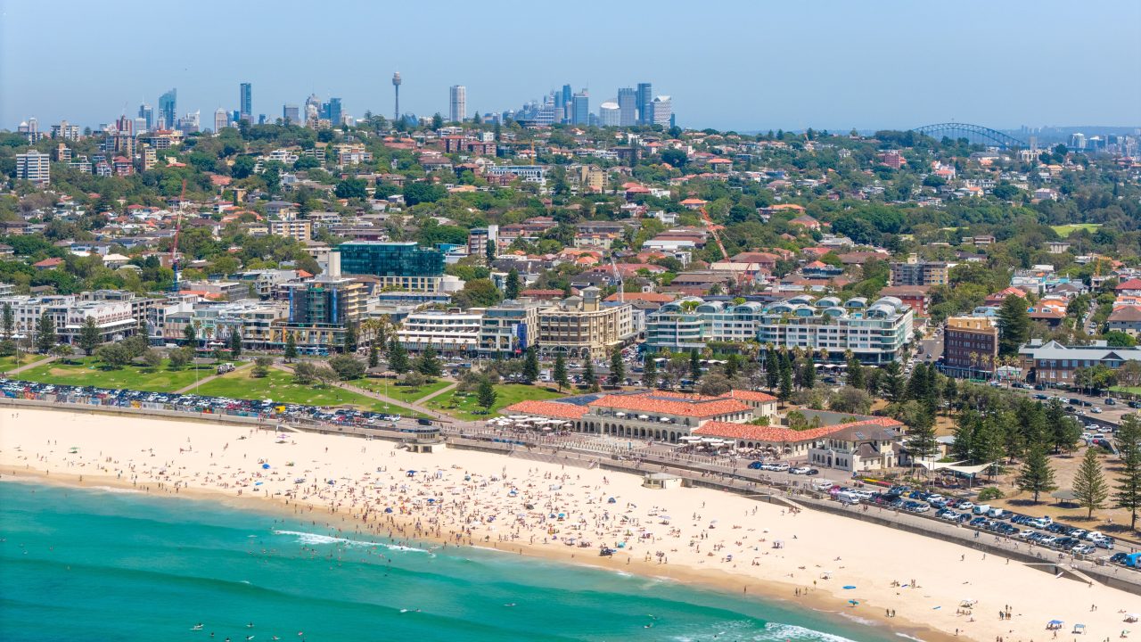 Aerial view of Bondi Beach and the Sydney coastline on a sunny day